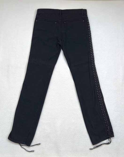 Alexander McQueen black jean with adjustable straps on the sides