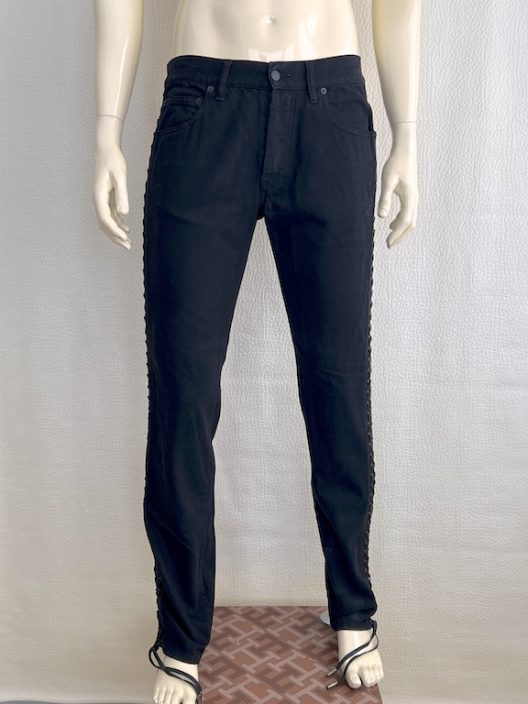 Alexander McQueen black jean with adjustable straps on the sides