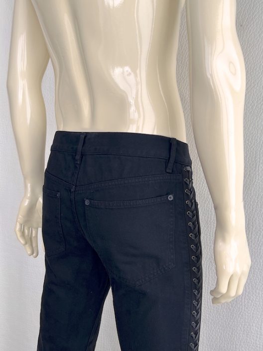 Alexander McQueen black jean with adjustable straps on the sides