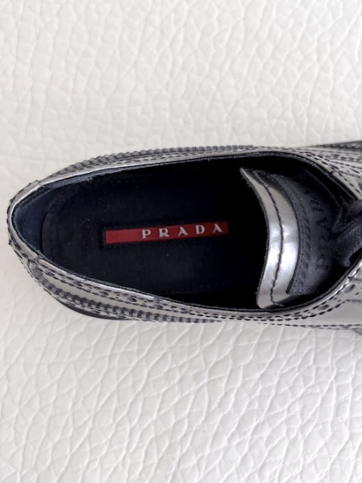 Prada metallic lace-up shoes