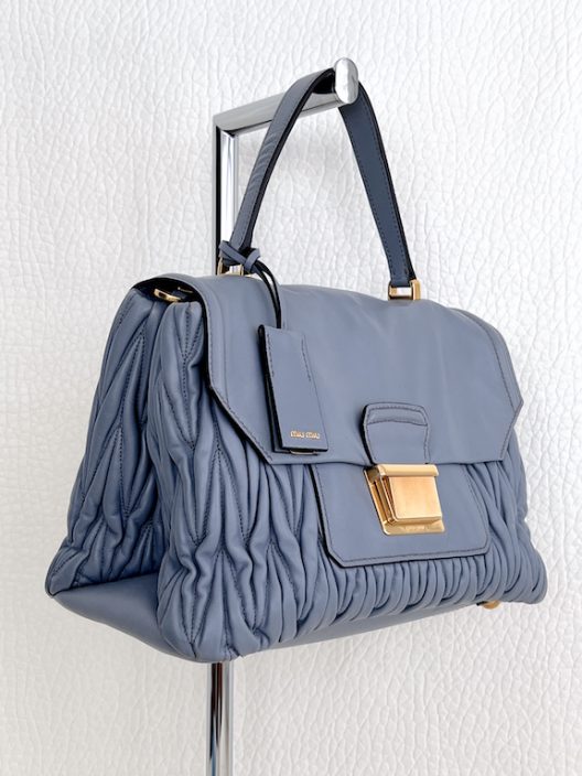 Miu Miu "Matelassé" handbag in light blue leather