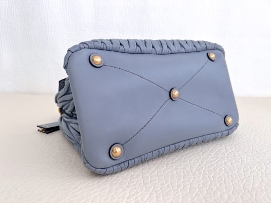 Miu Miu "Matelassé" handbag in light blue leather